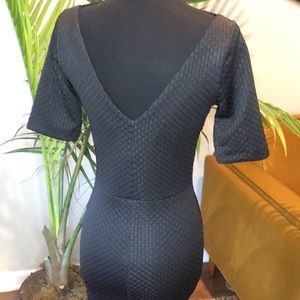 Beautiful sleek body con Back V dress